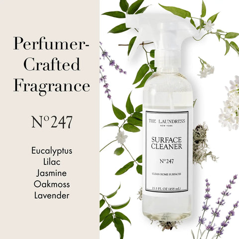 Go-To All Purpose Surface Cleaner No 247 Scent with perfumer crafted fragrance in 15.5 fl oz bottle next to eucalyptus and lavender leaves