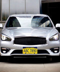 Silver car with Universal Front License Plate Bracket Kit For Cars, Quick Front Mount, Plastic Bumper Tag Adapter