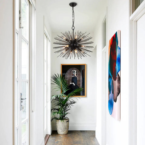 Black Sputnik Starburst Chandelier With 12 Lights 24 Inches Mid Century Firework Pendant Light Fixture in modern hallway.