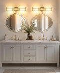 Klighten Hardwired Wall Sconce Modern Brushed Brass Bathroom Vanity Light above gray double sink vanity with mirrors