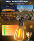 100 Feet Solar String Lights For Outdoor Use Waterproof With Remote Dimmable And Timable Three Lighting Modes 31 And 2 Shatterproof LEDs on patio.