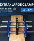 Top view of Self Centering Dowel Jig With Elongated Jaws And Extra Wide Clamp For Fast Accurate Woodworking The Setup Is A Breeze With This Durable Aluminum Alloy Drill Guide In A Bold Blue Finish Built For Lasting Craftsmanship And Easy DIY Projects clamping a wooden board up to 6.7 inches.
