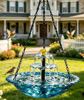 Solar Powered Cascade Hanging Bird Bath Fountain With No Battery Needed Water Pump Dispenser shown in a garden setting.