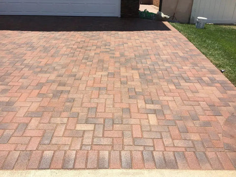 Rock Solid Penetrating Concrete Sealer 5 Gallon Solvent Based Wet Look Finish on stamped brick paver driveway.