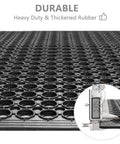 Close-up of heavy duty rubber floor mat with drainage holes, featuring a thickness measurement tool, 24 by 36 inches anti fatigue mat.