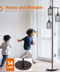 LED Industrial Floor Lamp With Three Cage Heads And Edison Bulbs, Tall Vintage Tree Style Lighting, black finish, next to children playing