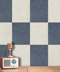 Pro Setup 6 Pack High Density Polyester Sound Absorbing Panels 16 By 12 Inches Tackable Acoustic Wall Tiles in a checkerboard pattern with a microphone.