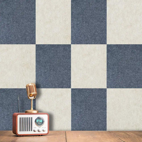 Pro Setup 6 Pack High Density Polyester Sound Absorbing Panels 16 By 12 Inches Tackable Acoustic Wall Tiles in a checkerboard pattern with a microphone.