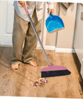 Heavy Duty Pink Broom With Extended Handle Sweeps Indoors And Outdoors Straight Up Tough On Grime Durable Steel Bristles clearing wood floor mess.