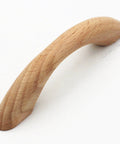 Close-up of an Unfinished Beech Wood Drawer Pull with natural grain, part of Ten Pack with Two And A Half Inch Center to Center for staining.