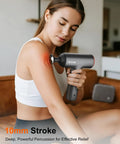 Woman using Thermal Massage Gun Deep Tissue Percussion Massager With Heat Handheld Muscle Therapy Device With Full Metal Head