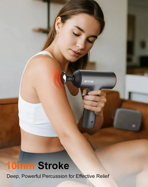 Woman using Thermal Massage Gun Deep Tissue Percussion Massager With Heat Handheld Muscle Therapy Device With Full Metal Head
