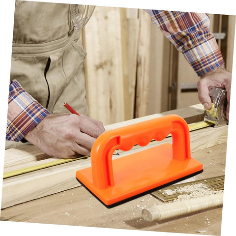 Heavy Duty Woodworking Safety Push Block For Table Saw And Router Tables Badass Shop Gear bright orange push block in use with measuring tape.