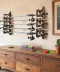Solid Wood Wall Mount Fishing Rod Rack Keeps Your Poles Neatly Stowed Holds Up To 10 Fishing Rods Perfect Garage Or Shed Organizer With Waterproof Finish And Heavy Duty Stability installed on wall with fishing rods.