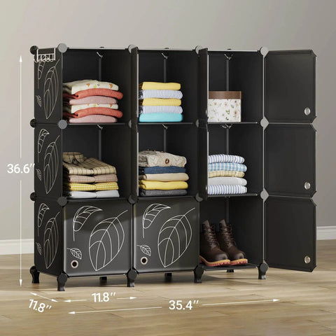 9 Cube Closet Organizer With Doors Portable Modular Storage Shelves For Clothes Books Toys Black Cube Cabinet partially open with folded clothes and shoes visible in cubes.