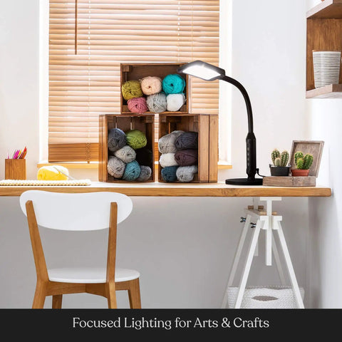 2 In 1 LED Floor And Desk Lamp With Adjustable Height And Gooseneck, lamp illuminating a craft table with yarn and cactus.