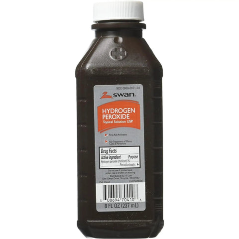 8 oz bottle of Swan hydrogen peroxide topical solution with white cap and label detailing drug facts.