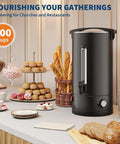 Heavy Duty Stainless Steel Coffee Urn Holds 120 Cups Keeps Your Crew Piping Hot With Double Wall Insulation, serving coffee at a catering setup.