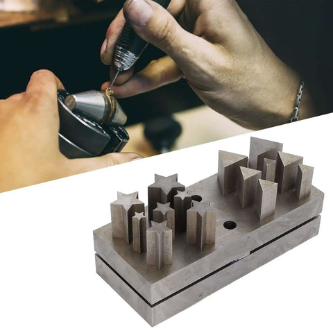 Close-up of Dope 15 Piece Disc Cutter Set with pentagram triangle punch dies on steel base for jewelry making and crafting.