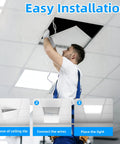 Installer placing 4 Pack 2x2 Ft LED Troffer Flat Panel Light 45W, 5800 Lumens, 5000K White, ETL Listed in a drop ceiling.