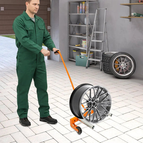Person using Beefy Heavy Duty Tire Dolly For Garage And Auto Repair Wheel Tire Moving Cart For Transferring Heavy Wheels Safely
