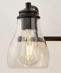 Close-up of bulb in Black Three Light Vanity Light Fixture With Clear Glass Shades For Bathroom Over Mirror, Modern Direct Wire