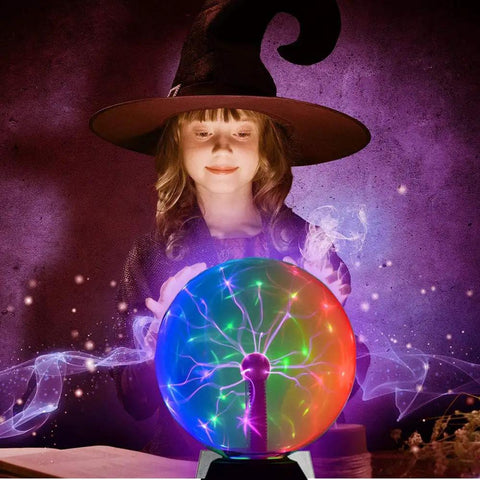 Child with witch hat interacting with Touch And Sound Sensitive Plasma Ball Lamp For Desk Or Nightstand