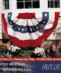 Patriotic 3 By 6 Feet Pleated Fan US Flag Half Fan Banner With Canvas Header And Brass Grommets Fade Resistant American Stars And Stripes 100 Percent Polyester Durable Flag For Home Parade Or Outdoor Display on a window ledge with flowers.
