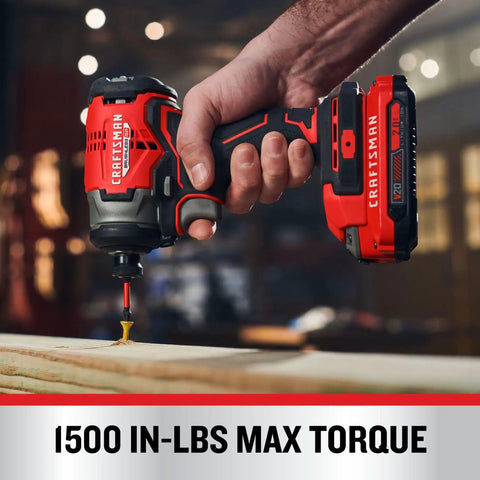 Person using V20 Cordless 1 Quarter Inch Impact Driver Bare Tool Only With Brushless Motor for driving a screw into wood.