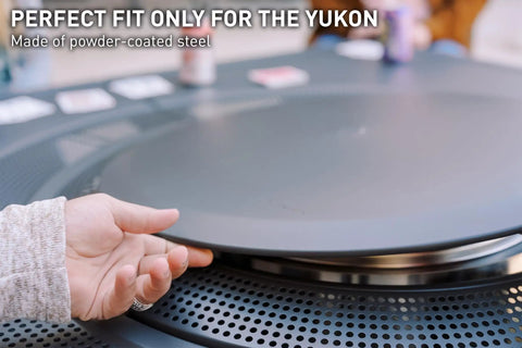 Hand placing Surround Surface For Yukon Fire Pit Lid Durable Cold Rolled Steel Shield Doubles As Backyard Tabletop, 34.5 inch.