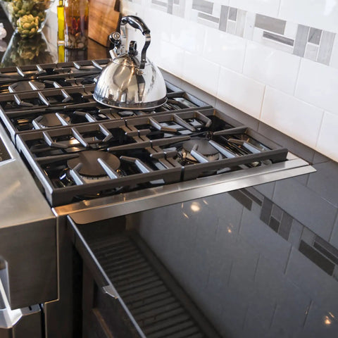Stainless Steel Stove Gap Covers 2 Pack for Kitchen Counter Gaps, installed on stove, showing clean and seamless gap coverage.