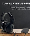 Electronic Shooting Ear Protection Muffs With 30 dB NRR and 0.01s Reaction Time connected to audio device on table