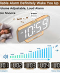 Slim Digital Mirror Alarm Clock With Gold Finish Dope LED Display showing large numbers and volume control levels.