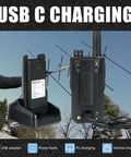 Rugged Dual Band Handheld Radio With IP68 Waterproofing, 2500mAh USB-C Battery shown on charging dock in outdoor setting.