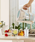 Person pouring water using a pitcher with Water Filter Replacement for Brita Pitchers and Dispensers, NSF Certified, 3 Pack.