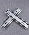 Two Pack Heavy Duty Steel Ball Bearing Drawer Slides With Buttery Smooth Gliding Action built for kitchen storage cabinets, silver steel finish.