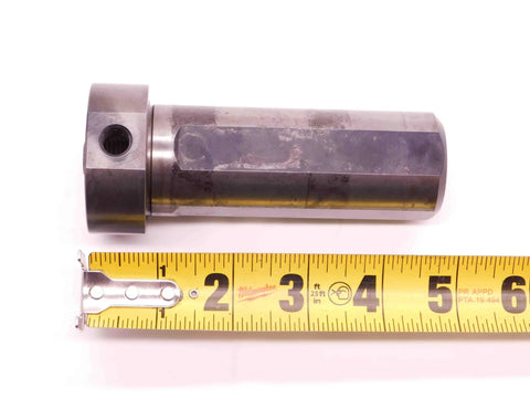 Capto C4 Modular Adapter For 1 1/2 Inch Shank Diameter With NC2000 Series Compatibility next to measuring tape