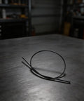 Flexible Drive Shaft 4137 711 3202 Replacement For FS90R FS91R FS110R FS80R Trimmers on a metal workshop table