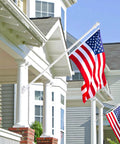 Top Shelf White Aluminum Flag Pole Rings With Grip Tight Clamps Two Pack No Sweat Antitwist Swivels For Slick 360 Degree Rotation And Hassle Free Patriotic Display with American flag.