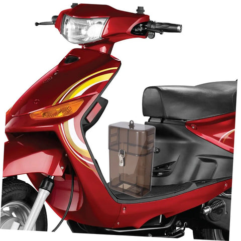 Rock Solid Waterproof Charger Cover For Electric Bike And Ebike Plug Protector Hood Guards Against Weather With Built In Cooling Vents And Effortless Mounting To Protect Your Ride From Elements Smooth City Cruising Everywhere on a red electric bike.