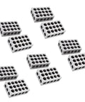 Scattered hardened steel 1-2-3 precision blocks with 23 holes for milling on white background