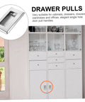 Hidden Recessed Pull Handle Set on white cupboard with glass doors, showcasing a space-saving stainless steel design for drawers and cabinets.