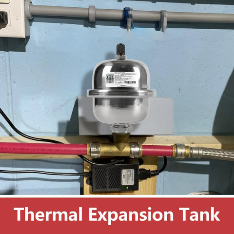 Compact Stainless Steel Thermal Expansion Tank With Hammer Arrestor For Tankless Water Heaters And Beverage Appliances 0.16 Liter Capacity Space Saving Half Inch MNPT Threaded mounted on wall with pipes