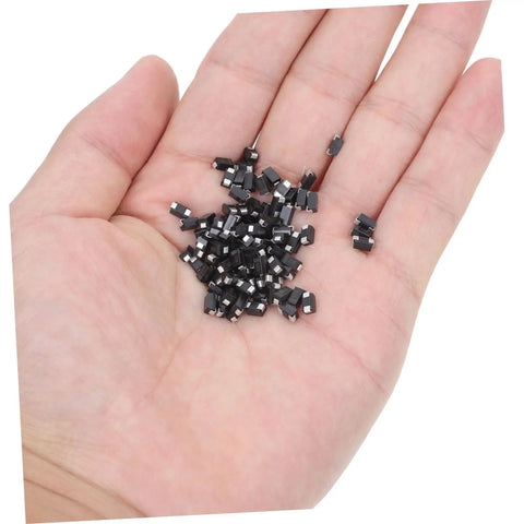 Hella Reliable 100 Piece SMD Rectifier Diode Pack in hand for high voltage circuits and automotive power supplies.