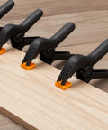 Five Pack Four And A Half Inch Spring Clamps For Backdrops And Crafts, Heavy Duty Plastic Clips For Photography Studio on wood