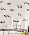 Bedroom with 12 Piece Inspirational Wall Decals Set With Peel And Stick Vinyl Quotes Removable Motivational Sayings For Office Nursery Classroom Dorm Teens Black Matte Finish on wall.