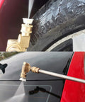 Close-up of Lucstar radiator cleaning wand accessory with brass quick-connect pivoting coupler and white nozzle
Installed view of Lucstar radiator cleaning wand on red car, long metal wand spraying windshield