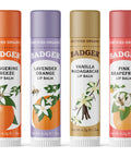Must Have Organic Lip Balm Gift Set Four Flavor Pack Featuring Tangerine Lavender Orange Vanilla Grapefruit Silky Long Lasting Moisturizer For Dry Lips With All Natural Beeswax Olive Oil And Aloe on white background
