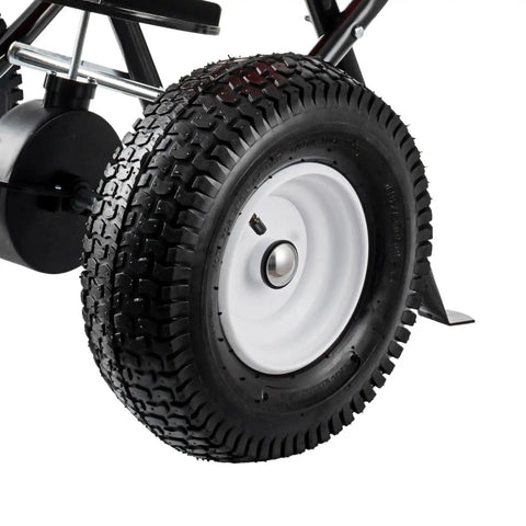 Close-up of all terrain 12.5 inch pneumatic tire on a Walk Behind Broadcast Fertilizer And Seed Spreader With 90 Pound Capacity And 23 Liter Hopper