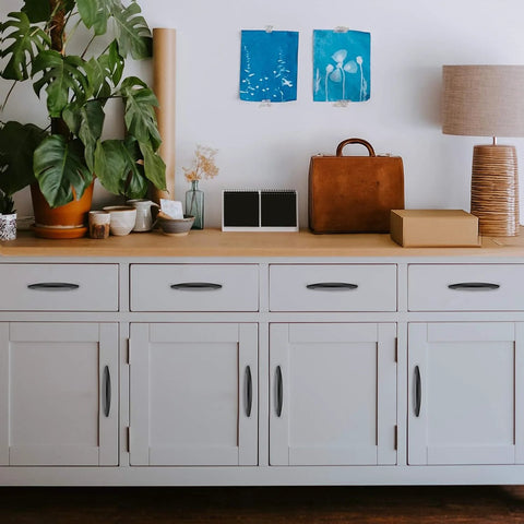Modern kitchen with white cabinets featuring 30 Pack 3 Inch Matte Black Cabinet Handles for Cabinets and Drawers, Kitchen Hardware Pulls.